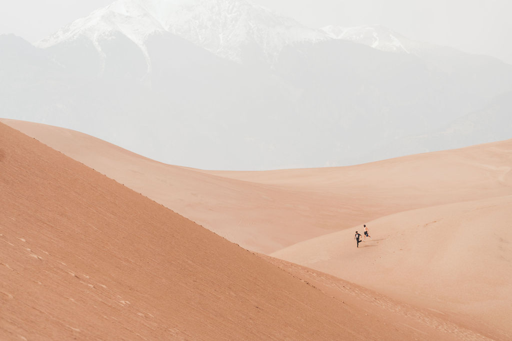 Couple hiking at Great Sand Dunes National Park